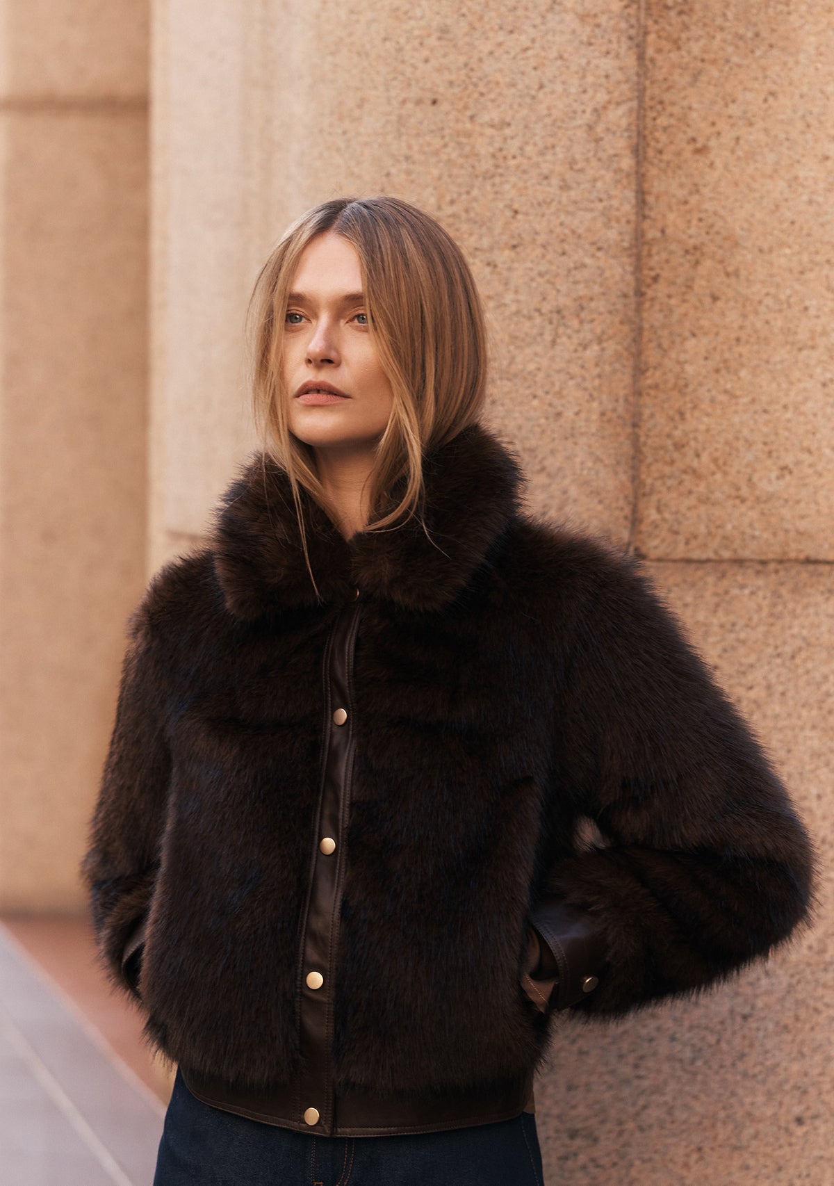 woman wearing fluffy chocolate brown jacket
