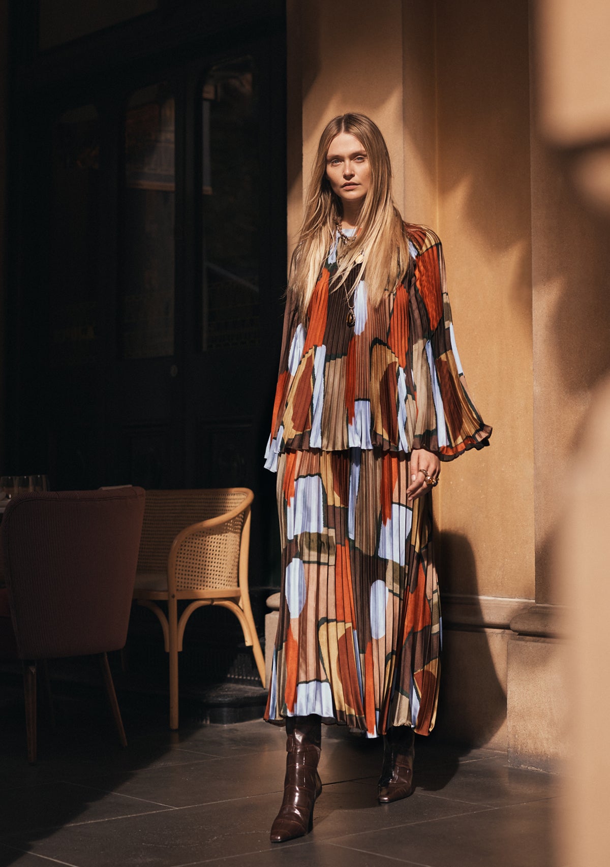 woman wearing printed matching pleated set